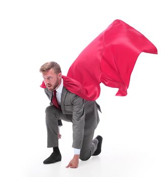 side view . superhero businessman is ready to start. isolated on white background