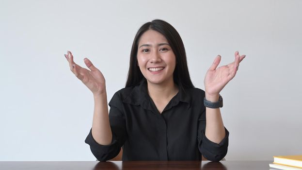 Confident asian woman making video conference, online distant job interview.