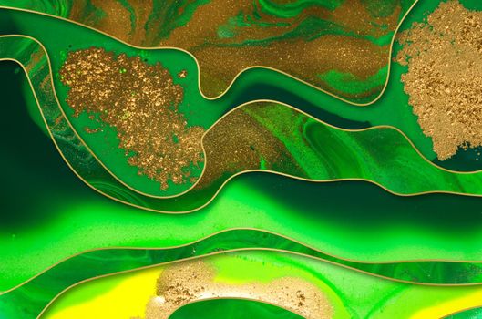Streams of liquid green and gold ink curls. Waves of fluid paints
