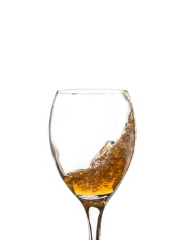 Classic glass and splashing liquid, isolated on a white background. Close. Different color