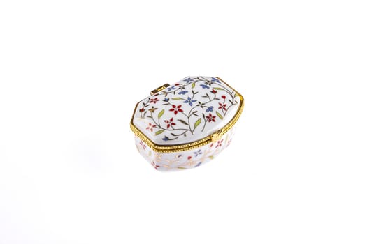 Beautiful porcelain or ceramic vintage box for jewelry, isolated on white background