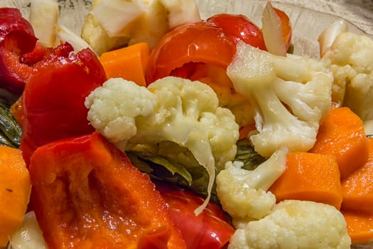 Traditional Bulgarian winter salad with pickles, cauliflower, carrots, bell peppers and garlic. Close up