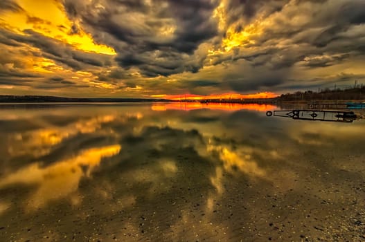 Stunning long exposure clouds with transparent water reflection