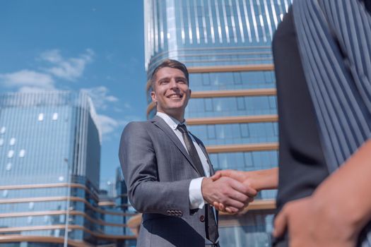 successful businessman meeting a young employee with a handshake. photo with copy space