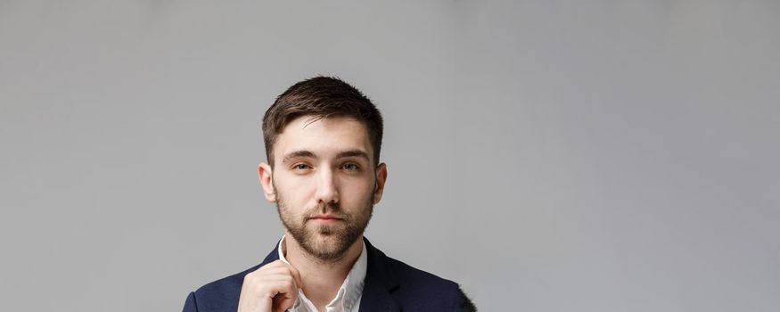 Business Concept - Portrait handsome stressful business man in suit shock looking in front of laptop at work office. White Background