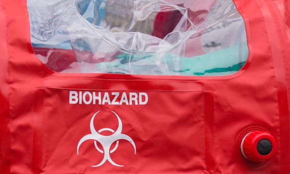 biohazard, virus, face in protective suit and gas mask