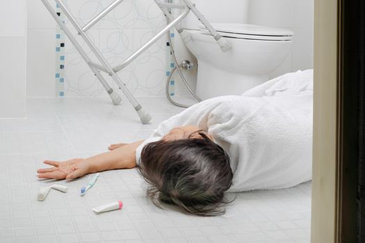 Elderly woman falling in bathroom because slippery surfaces