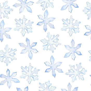 Watercolor hand drawn seamless pattern with blue snowflakes. Christmans New Year snow design in nordic scandinavian style. Snowfall background for holiday greeting cards wrapping paper