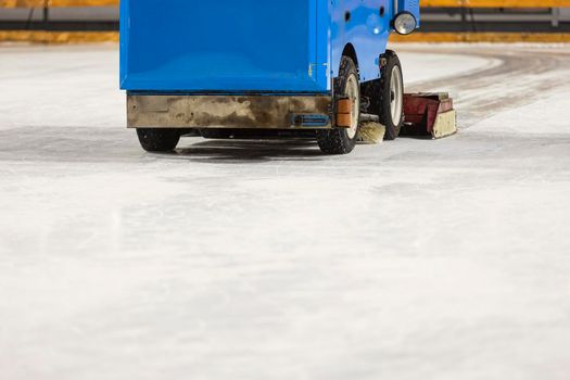 machine leveling the ice on the skating rink