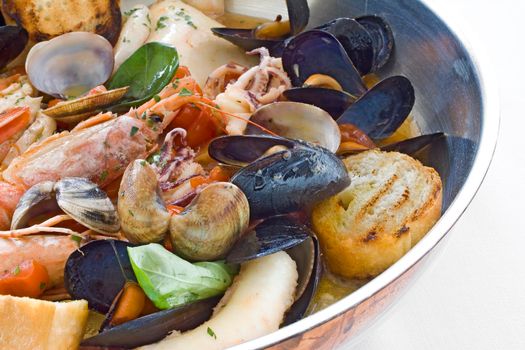 Sea food pan italian cuisine with mussels, clams, scampi and shrimp