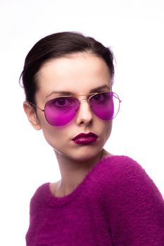 female in a purple sweater, purple glasses with purple lipstick on her lips. High quality photo