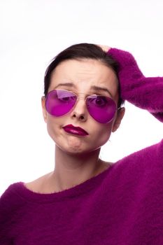 female in a purple sweater, purple glasses with purple lipstick on her lips. High quality photo
