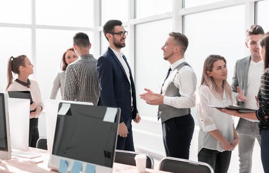 workplace employees in a modern office. photo with copy space