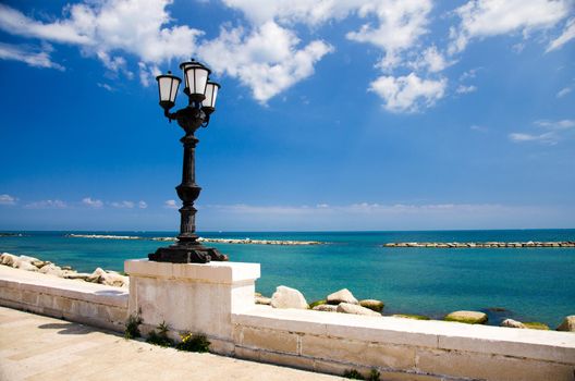 Embankment promenade Imperatore Augusto with street light and view of Adriatic sea in the city of Bari, Puglia Apulia region, Southern Italy