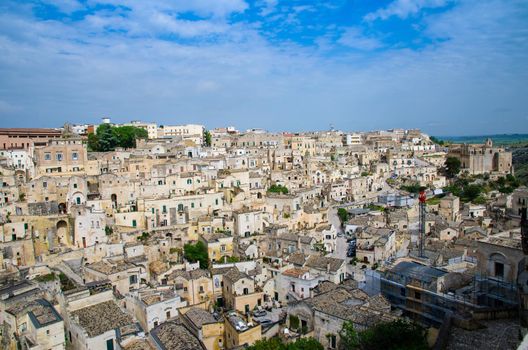 Matera panoramic view of historical centre Sasso Barisano of old ancient town Sassi di Matera with rock cave houses, European Capital of Culture, UNESCO World Heritage Site, Basilicata, Southern Italy