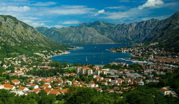 Top view of Boka Kotor bay and Old Town Kotor from Lovcen Mountain in front of Dinaric Alps mountains range, Montenegro