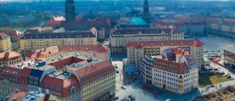 Panoramic view of Dresden city with central square and old buildings from view platform of lutheran church of Our Lady Frauenkirche, Germany