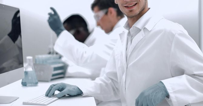 head of the research center sitting at his Desk.science and technology