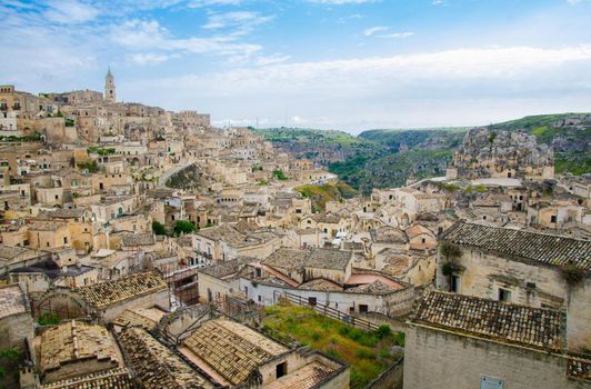 Matera panoramic view of historical centre Sasso Caveoso of old ancient town Sassi di Matera with rock cave houses, European Capital of Culture, UNESCO World Heritage Site, Basilicata, Southern Italy