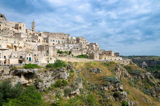 Matera view of historical centre Sasso Caveoso of old ancient town Sassi di Matera with rock cave houses, European Capital of Culture, UNESCO World Heritage Site, Basilicata, Southern Italy
