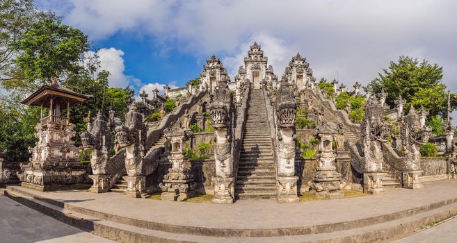 Three stone ladders in beautiful Pura Lempuyang Luhur temple. Summer landscape with stairs to temple. Paduraksa portals marking entrance to middle sanctum jaba tengah of Pura Penataran Agung, Bali.