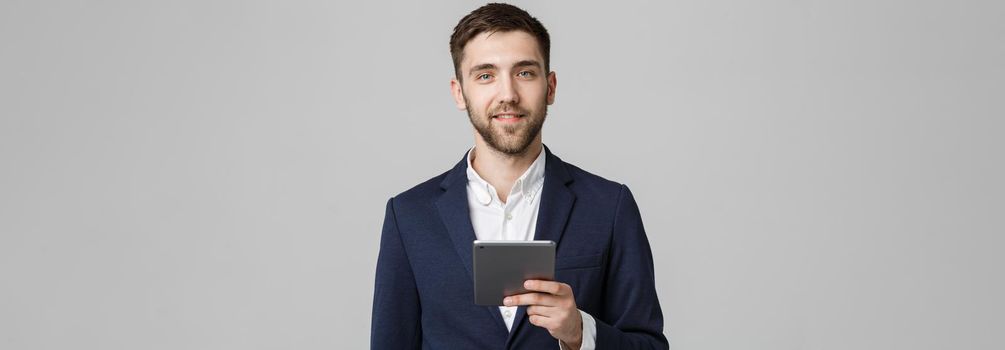 Business Concept - Portrait Handsome Business man playing digital tablet with smiling confident face. White Background. Copy Space.