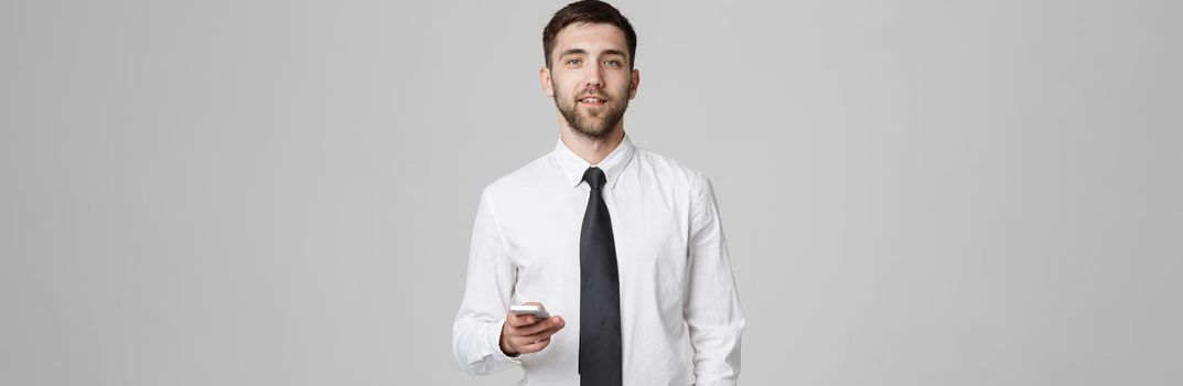 Lifestyle and Business Concept - Portrait of a handsome businessman enjoy talking with mobile phone. Isolated White background. Copy Space.