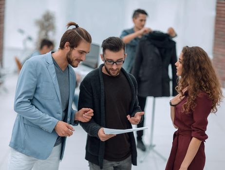 group of designers discussing the sketches.photo with copy space.