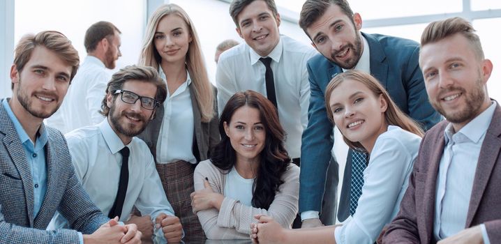 professional team of young business people sitting at the table. the concept of teamwork