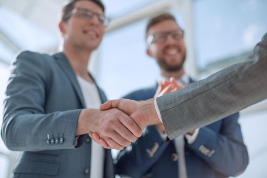 close up. successful business people shaking hands . business concept