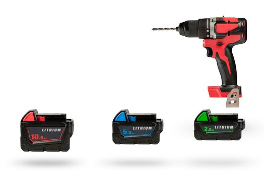 Batteries for cordless tools, a large set of tools from different angles. Batteries for a screwdriver of different capacities and different sizes, isolated on a white background. Electric drill with.