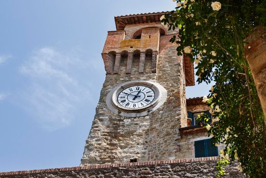 Clock tower in Passignano sul Trasimeno pleasant small town in Umbria , Italy, tourist centre
