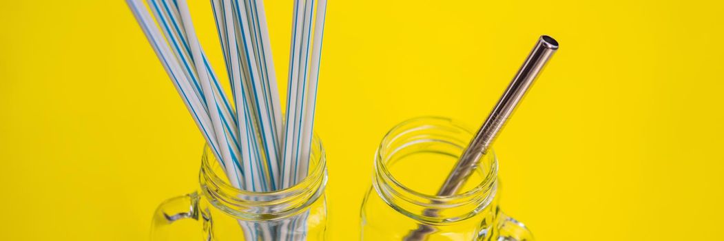 Steel drinking vs disposable straws on a yellow background. Zero waste concept. BANNER, LONG FORMAT