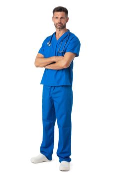 Full length portrait of a male doctor or nurse standing with arms folded isolated on a white background
