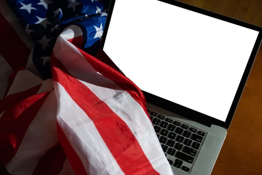 Laptop with USA flag, screen Isolated on white background.
