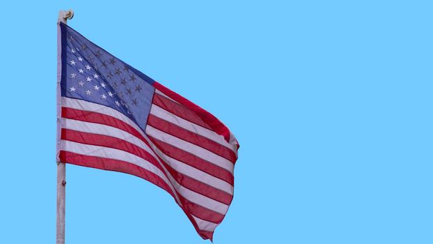 illustration of American Flag waving in sky backdrop