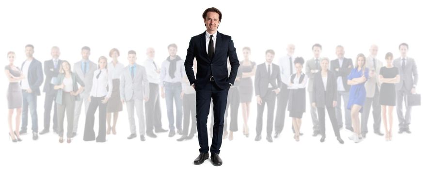 Businessman standing in front of his colleagues team isolated over white background