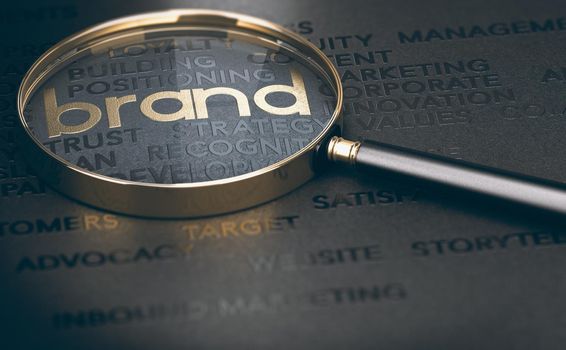 Brand marketing and management, branding or rebranding concept. 3d illustration of a magnifying glass over golden and black words.