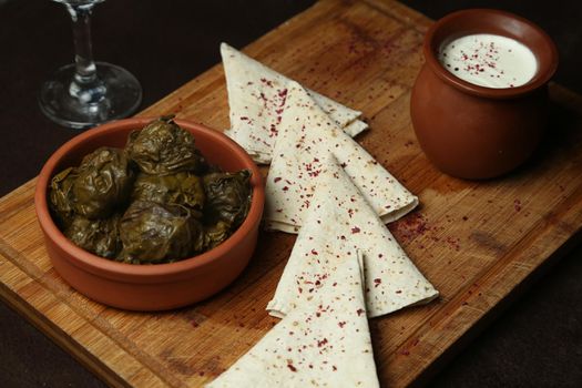 Traditional Turkish Dolma with Yogurt. turkish traditional meal