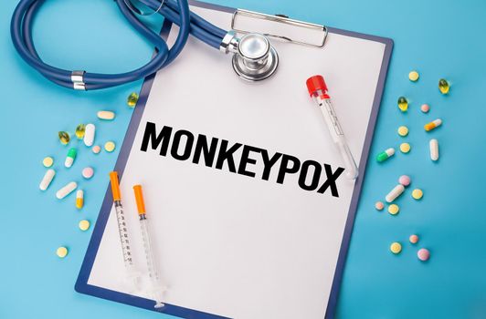 Monkeypox infectious disease diagnosis medical concept. Monkeypox virus concept. Monkey smallpox type, stethoscope and notebook written with Monkeypox.