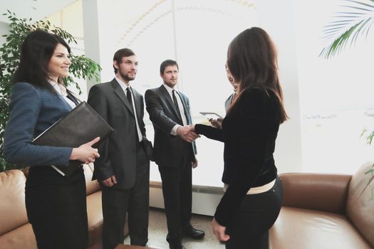 close up.business team and handshake business partners before starting a business meeting.photo with place for text