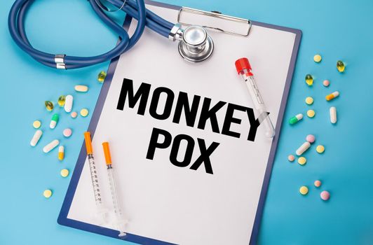 Monkeypox infectious disease diagnosis medical concept. Monkeypox virus concept. Monkey smallpox type, stethoscope and notebook written with Monkeypox.