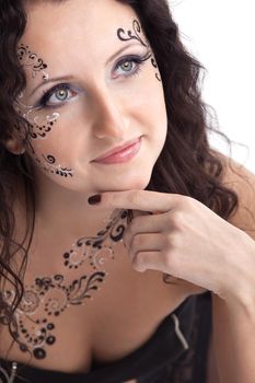 Beauty woman face with paint close-up portrait