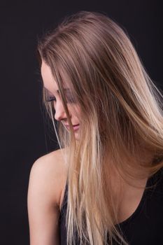 Young beauty blond girl with long hair in dream