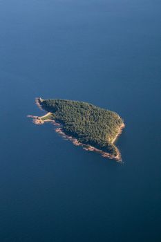 Sangster Island in Strait of Georgia near Vancouver Island, British Columbia, Canada. Viewed from an aerial perspective on a sunny summer day.