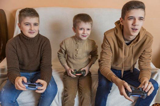 children playing console with joysticks