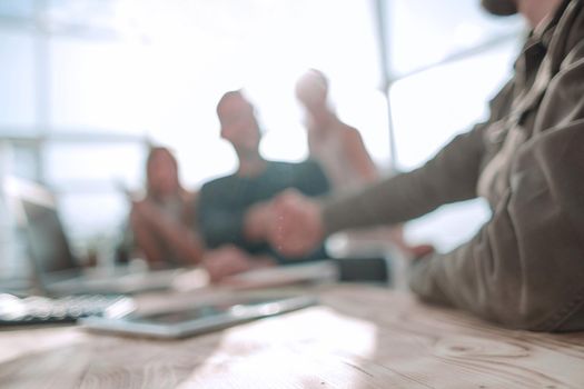 handshake business people at a meeting in the office. the concept of partnership .