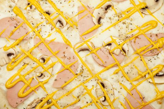 The texture of a delicious pizza Ham mushrooms served on a wooden plate, the ingredients are signature sauce, mozzarella cheese, ham, mushrooms, mustard sauce on white. Pizzeria promotion poster.