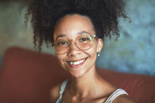 Shot of a beautiful African woman working from home