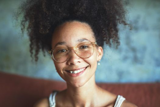 Shot of a beautiful African woman working from home